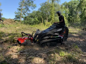 Mini tracked loaders